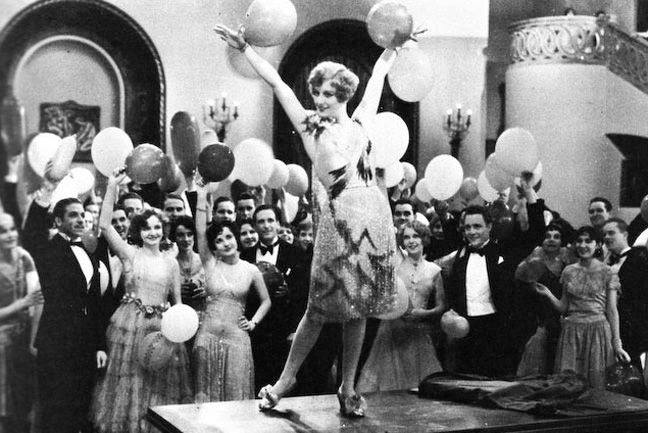 a classy 1920s party complete with flappers and balloons