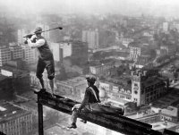 Golfers on a new york city skyscraper