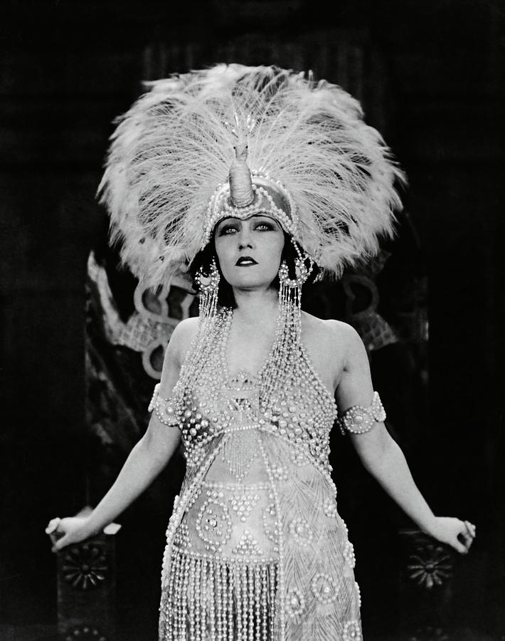 Gloria swanson exuding her persona with an adornment of pearls